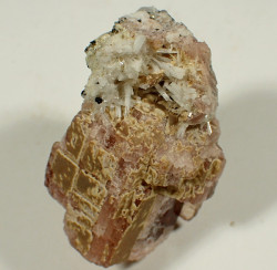 Bertrandite, rhodochrosite