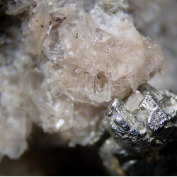 Bertrandite, muscovite, pyrite