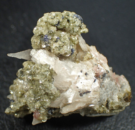 Bertrandite, muscovite