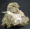 Bertrandite, muscovite