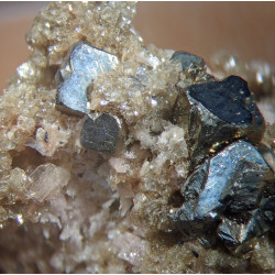 Muscovite, pyrite, bertrandite