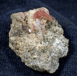 Rhodochrosite, bertrandite