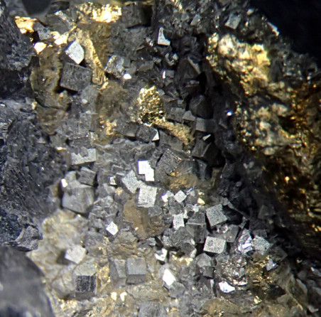 Close-up of tiny pyrite cubes in chalcopyrite