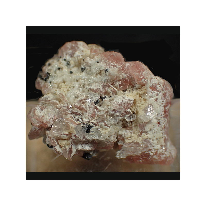 Rhodochrosite, bertrandite