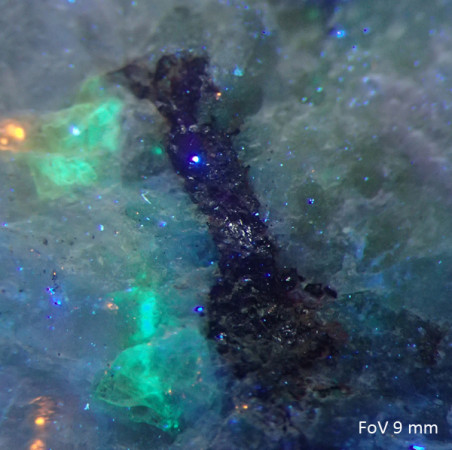 Fluorescent (LW UV) secondary mineral