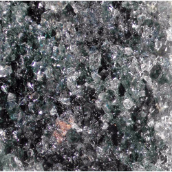 Close-up of very pale green, granular trolleite and blue lazulite-scorzalite