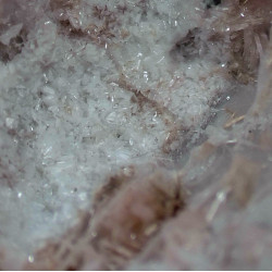 White mountainite and pink zorite