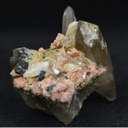 Bertrandite, rhodochrosite