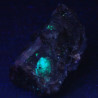 Fluorescent opal on quartz