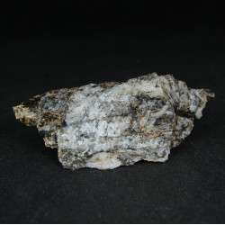 Coating of white, silky tengerite-(Y)