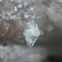 0.5-0.7 mm dipyramidal berborite crystal