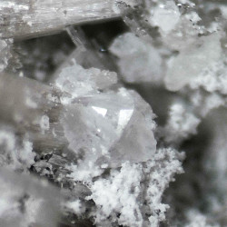 A 1x1 mm and some smaller berborite crystals