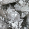 A 1x1 mm and some smaller berborite crystals