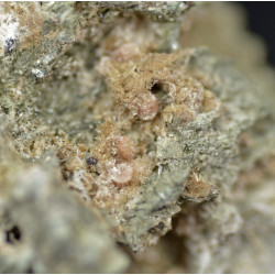 Small yellowish pink zorite spherules